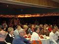 STLCC members listen as Fr. Stanger speaks
